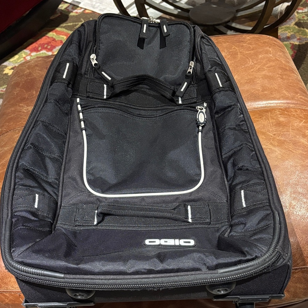 OGIO Black and White Kickstart 22” carry on with 2 wheels
